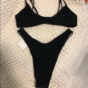 Three brand new swimsuits